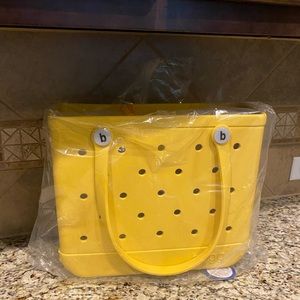 Brand new Yellow baby bogg bag